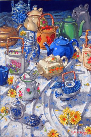 About twelve teapots of various shapes are standing on a white patterned cloth.