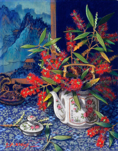 A china teapot containing bottlebrush flowers.